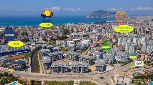 uma vista aérea de uma cidade com edifícios em SA Apartments! Crystal Family Apartments em Alanya