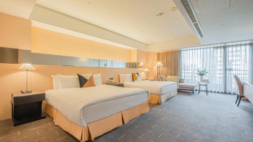 Tempat tidur dalam kamar di CHECK inn SELECT Taichung Dadun