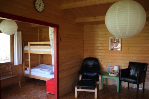 A bed or beds in a room at Ferienhütte Barsdorf