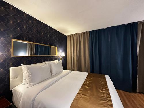 Tempat tidur dalam kamar di Superior Queen Room-Non Smoking