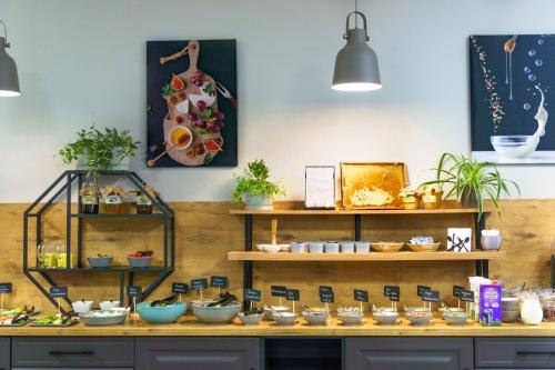 a store with bowls and other items on display at Hotel 107 in Rumia