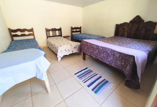 A bed or beds in a room at Rancho Vale Verde