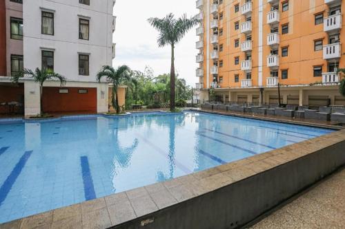 The swimming pool at or close to OYO 93645 Akasia Budget