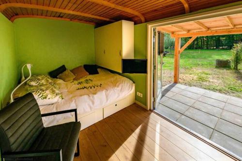 Katil atau katil-katil dalam bilik di Tinyhouse De Woord