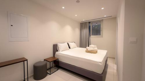 เตียงในห้องที่ City Napa Seaview Villas - Villa 4