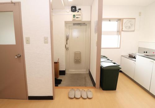 Bathroom sa GLOCE SeasideApartment 海目の前!駐車場付