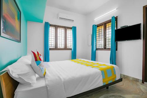 Hotel O Vibrant Stay Near Uthandi Beach 객실 침대