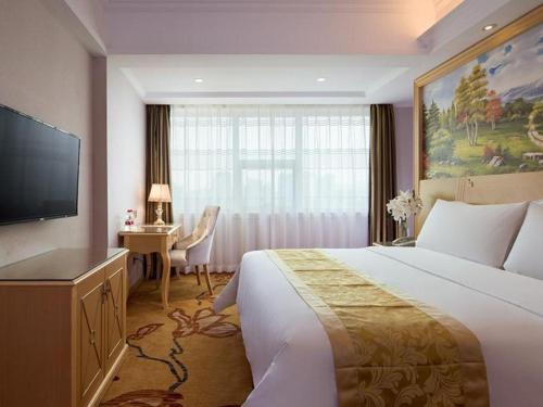 Voodi või voodid majutusasutuse Vienna Hotel Hangzhou West Lake Qingchun Road toas