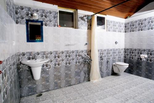 Un baño de Rock Haven Wayanad