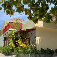 Aasna Inn: Thulusdhoo şehrinde bir otel