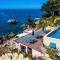 Beachfront RED APARTMENTS With Pool