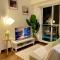 Cozy 1 BR Scandinavian/Tropical Condo with Balcony & Parking