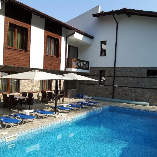 Relax Houses, hotel din Garmen