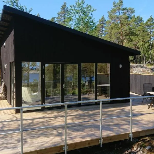 Kvarnsands Strandstugor / Kvarnsand Beach Lodges, hótel í Grisslehamn