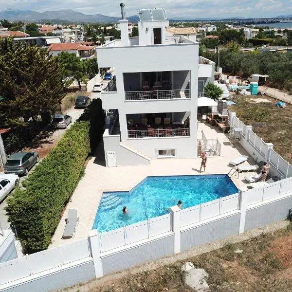 Villa d'Irene-near athens airport , 200 meters from the beach davis – hotel w mieście Artemida