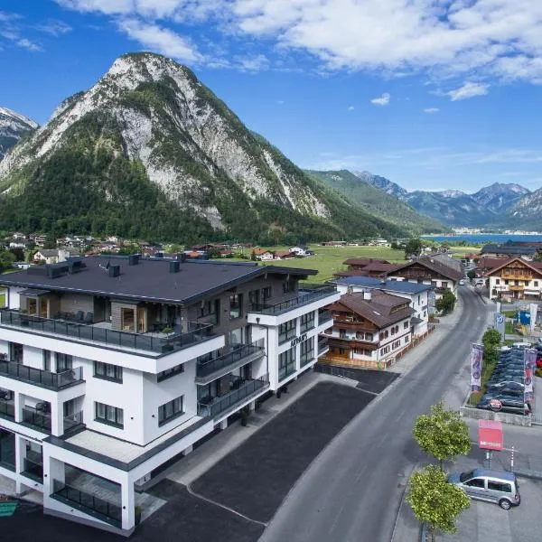 Arthur's Hotel und Apartments am Achensee, отель в Маурахе