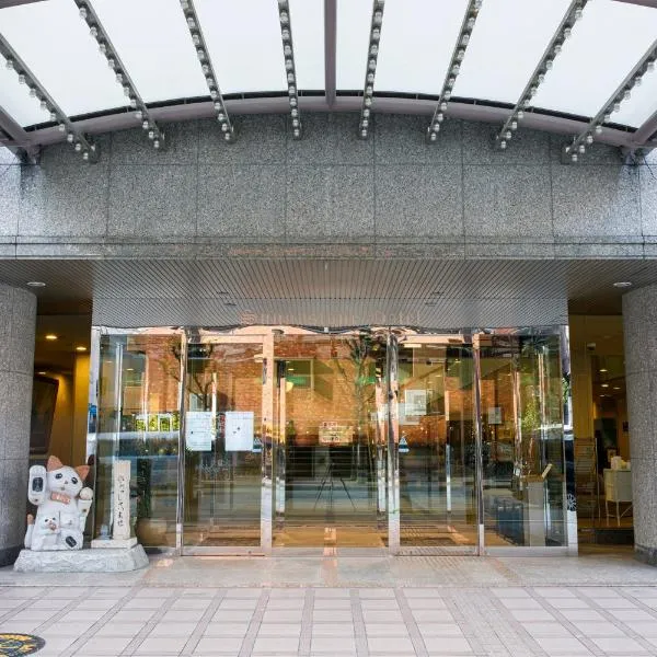 Sunny Stone Hotel, hotel en Minō