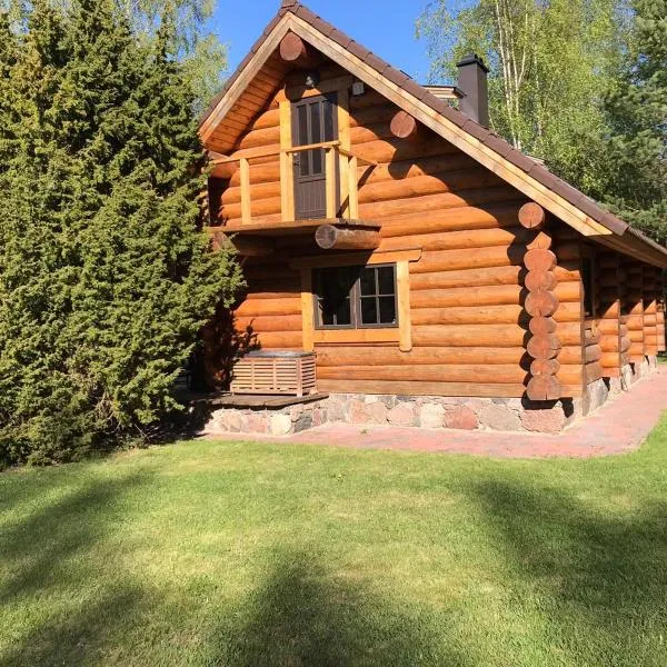 Excellent log house with a sauna in Lahemaa!, хотел в Kolga