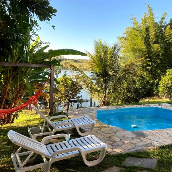 Casa com piscina fundo pra represa e AR Condicionado CasinhaBrancaDeVaranda, hotel sa Lavras