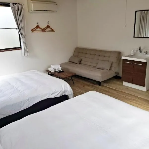 Guest House Tatara، فندق في يوناغو