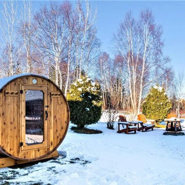 Spa, sauna et foyer : Le Phare de Baie-Saint-Paul, hotel in Baie-Saint-Paul