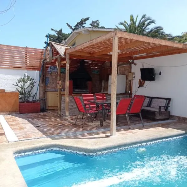 Cómoda casa con piscina、アリカのホテル