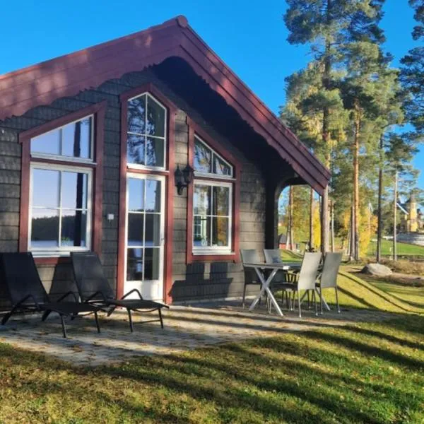 Lakeside log cabin Främby Udde Falun, hotel em Borlänge