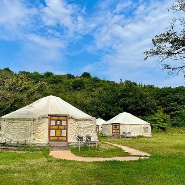 直島町ふるさと海の家 つつじ荘 -SeaSide Park Stay Tsutsujiso-, viešbutis mieste Naošima