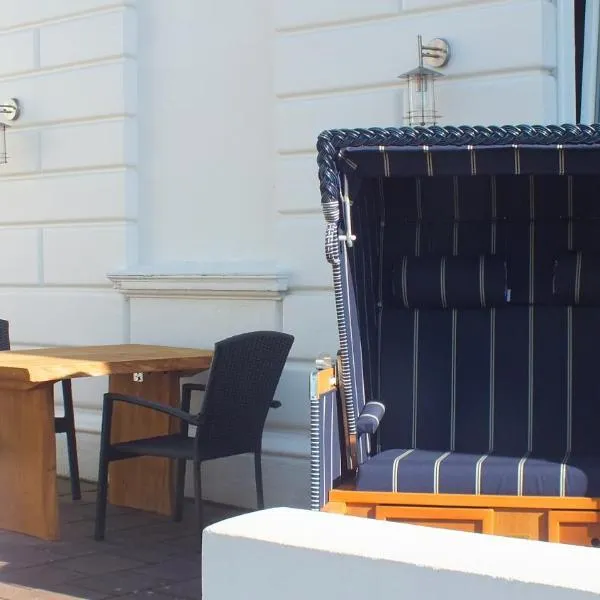 Zentrale Wohnung in der Villa Liewald mit Terrasse und Glasfaseranschluss, hotel en Norderney