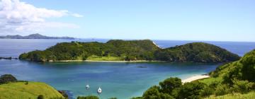 Boenden vid stranden i North Island