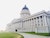 Side angle photo of a white marble capital building