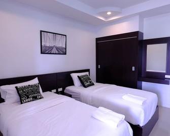 Inday Hotel - Sawang Daen Din - Quarto