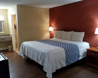 Econo Inn - Ormond Beach - Bedroom