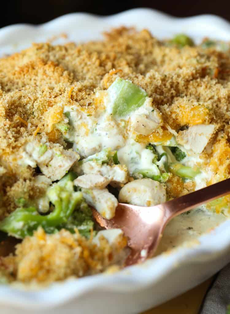 Chicken Divan casserole in a white baking dish.