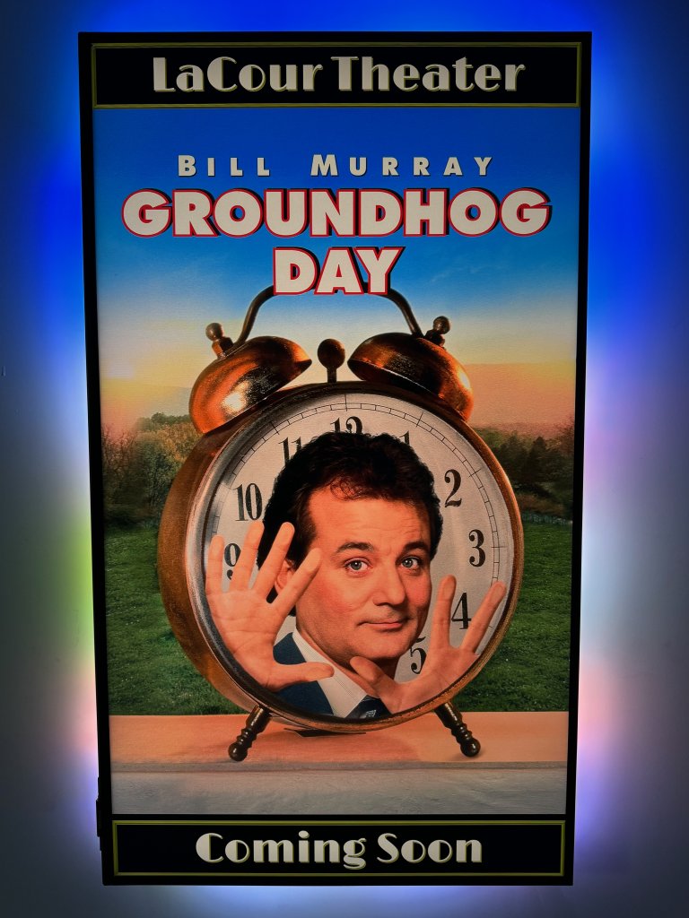 Magic Poster displaying a poster for the movie Groundhog Day