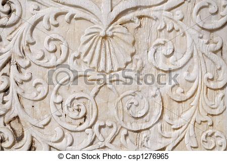 Stock Images of carved marble wall decoration.