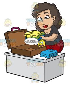 A Woman Packing Her Suitcase For A Vacation.