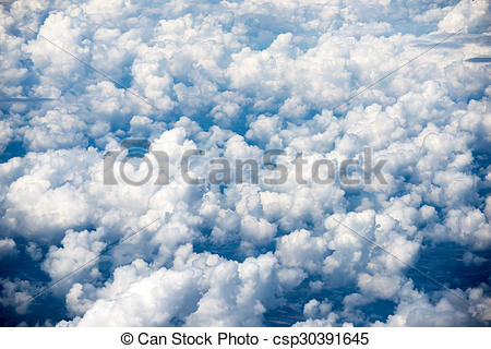 Stock Photo of Cloudscape. Blue sky and white cloud. Sunny day.