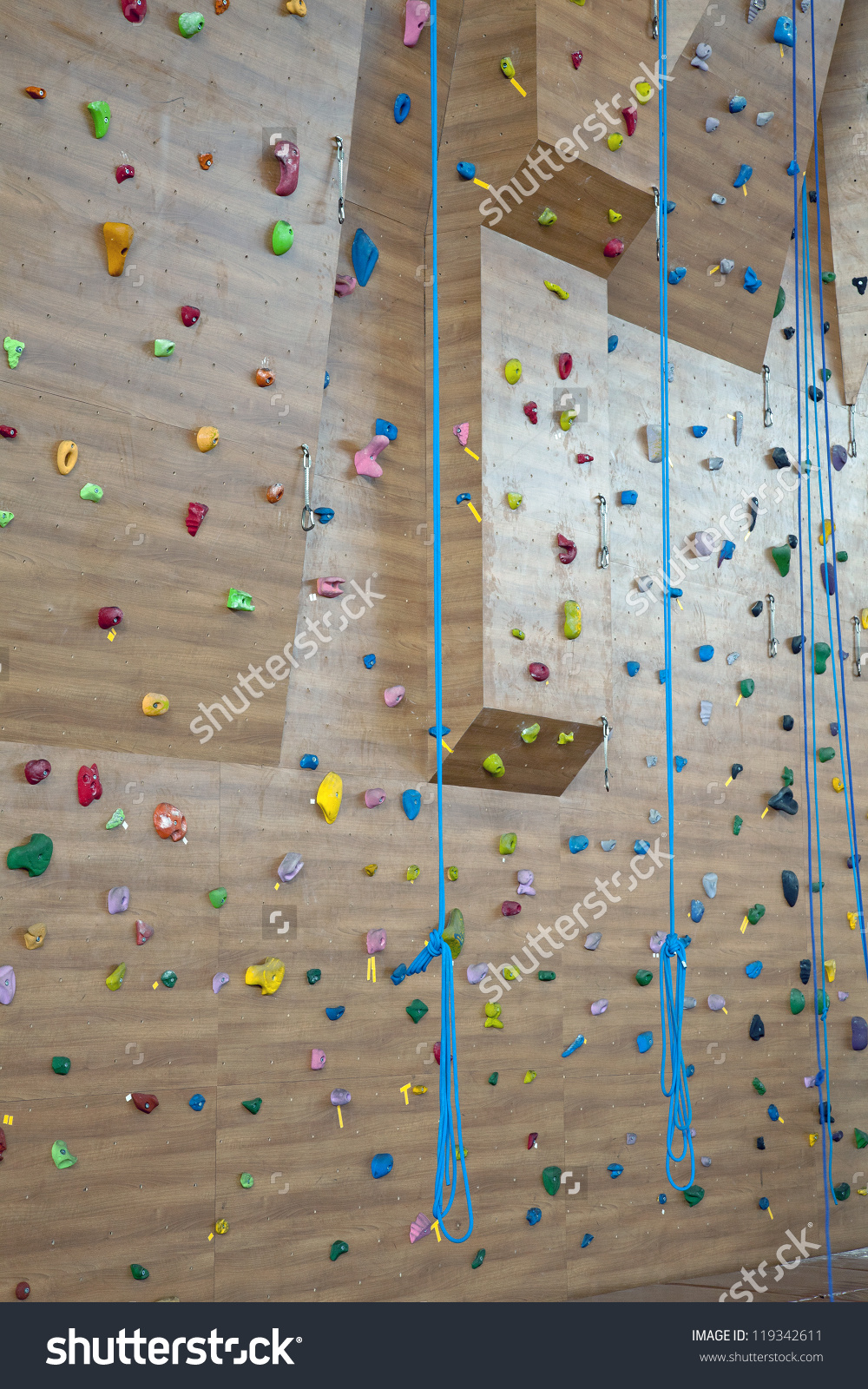 Grungy Surface Of An Artificial Rock Climbing Wall With Toe And.