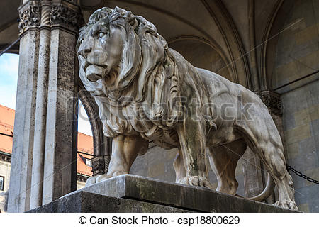 Stock Photo of Munich, Bavarian Lion Statue in front of.