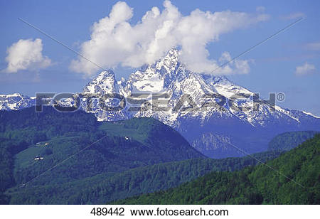 Stock Photo of Clouds over snowcapped mountain, Mt Watzmann.