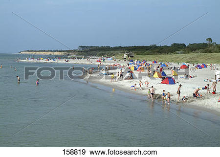 Stock Photograph of Tourists on beach, Fischland.