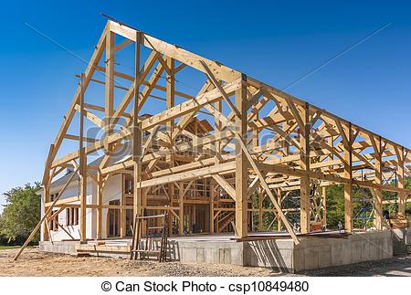 Pictures of New House Construction Framing with room for copy.