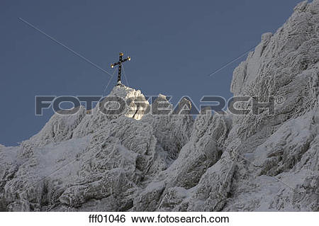 Stock Images of Germany, Bavaria, Kampenwand, Cross on mountain.