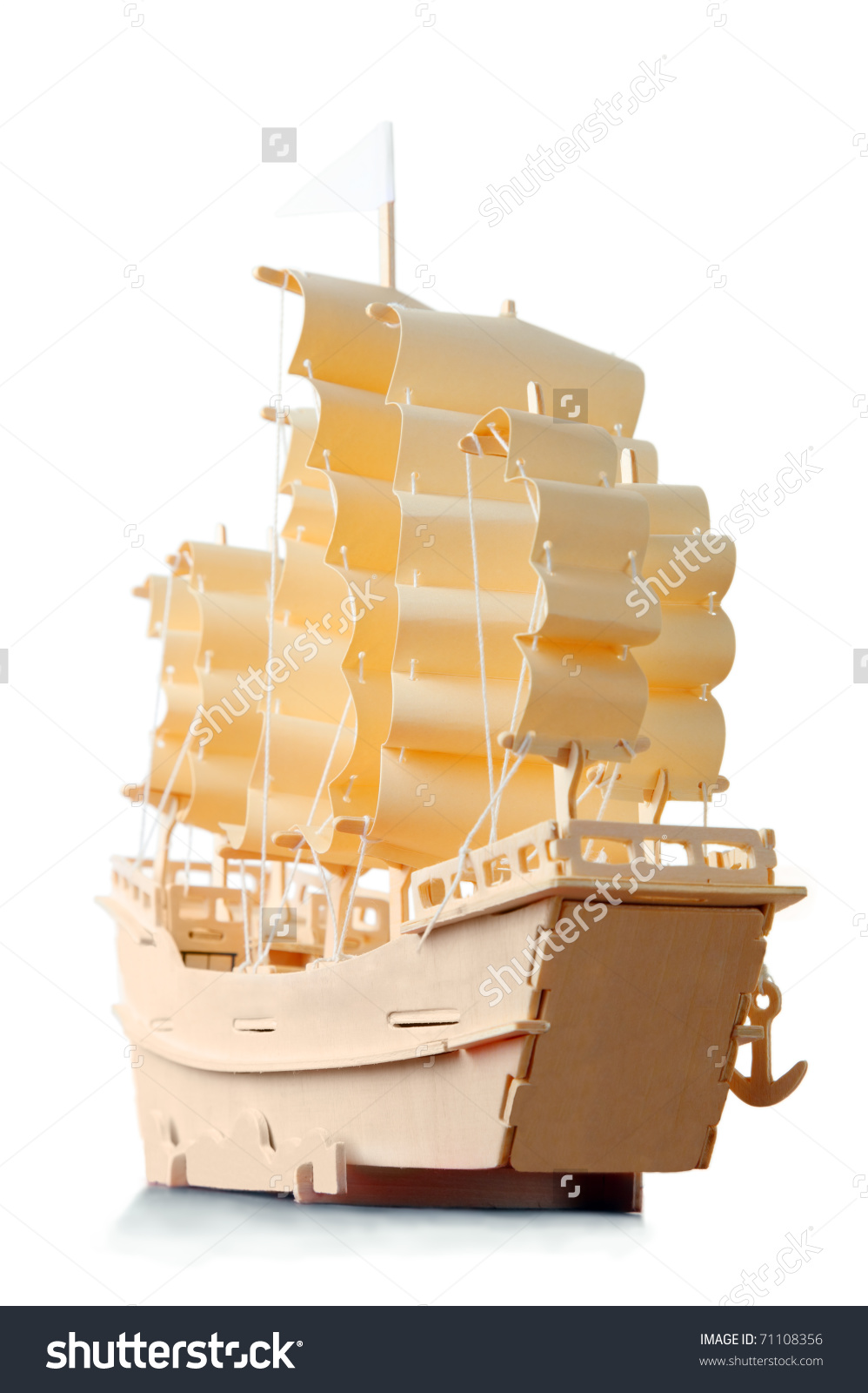 Homemade Wooden Ship With Paper Sails And Flag, View From Stern.