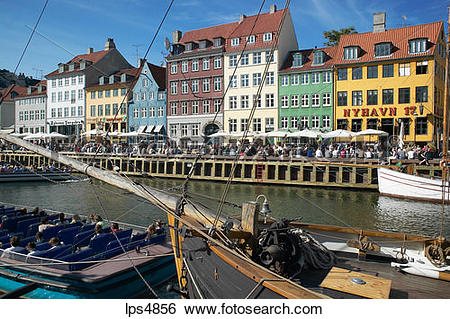 Stock Images of MOORED SAILBOATS ANCIENT HOUSES AND WATERFRONT.