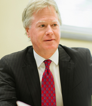 John B. Simpson, Charlottesville Commercial Litigation Attorney.