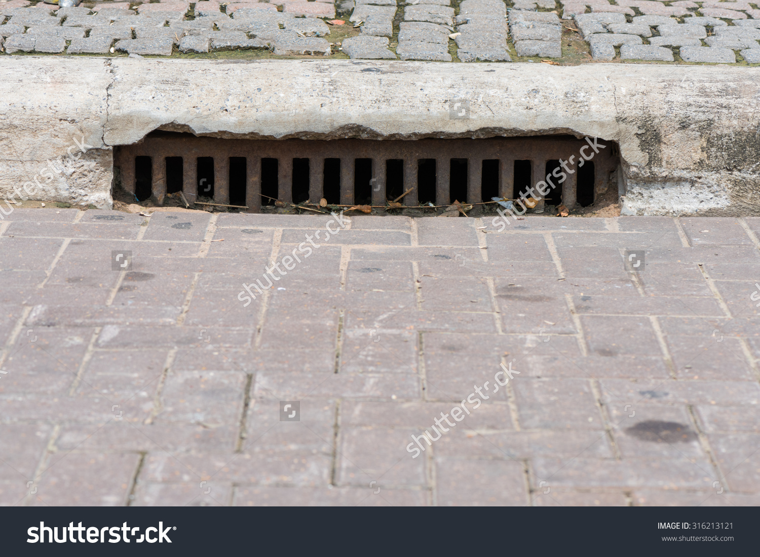 Drain Gutter Road Next Pavement Showing Stock Photo 316213121.