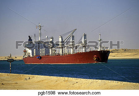 Pictures of Suez Canal, Egypt. Bulk carrier sailing through the.