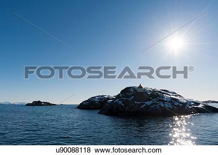 Pictures of Sunlit rocky island, Svolvaer, Lofoten Islands, Norway.